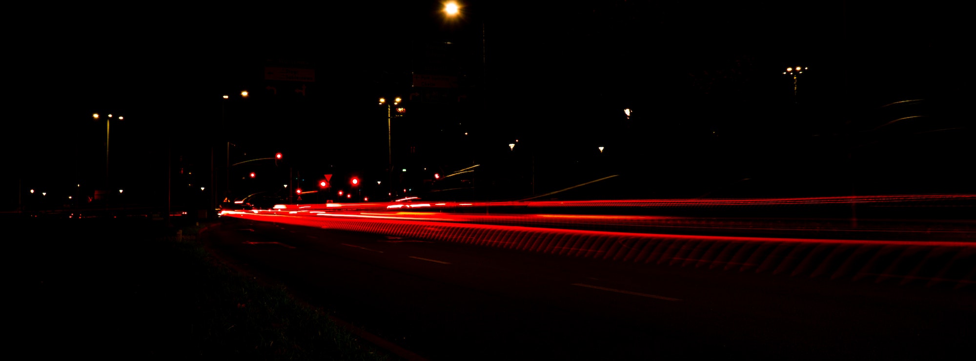 Lights of cars at night. Street line lights. Night highway city. Long exposure photograph night road